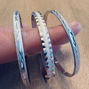 Set of three silver Trifari vintage bracelets